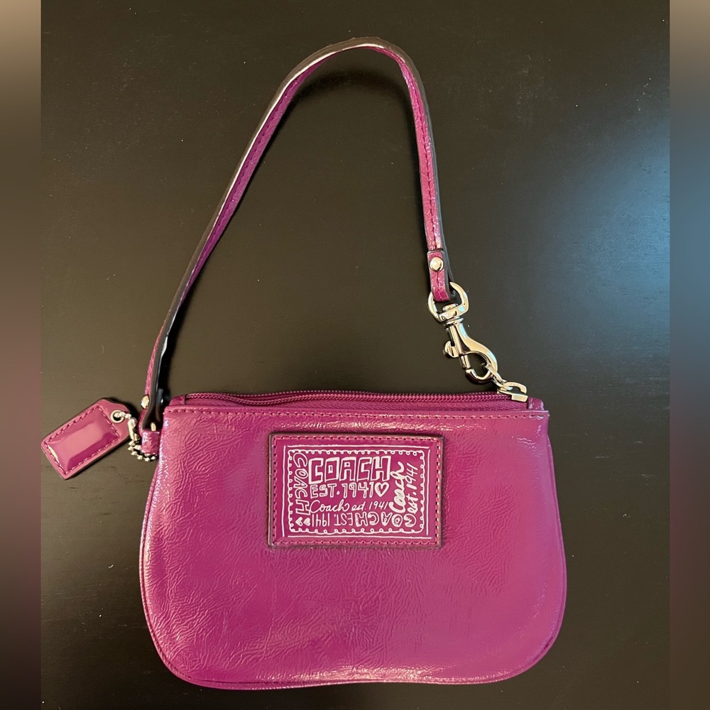 Hot pink leather coach wristlet